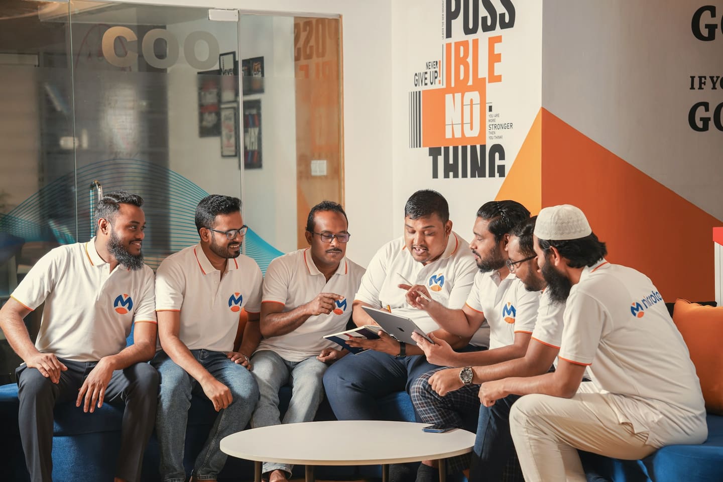 A business team in conversation in their office